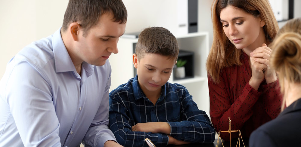 Divorced parents with lawyer for family law