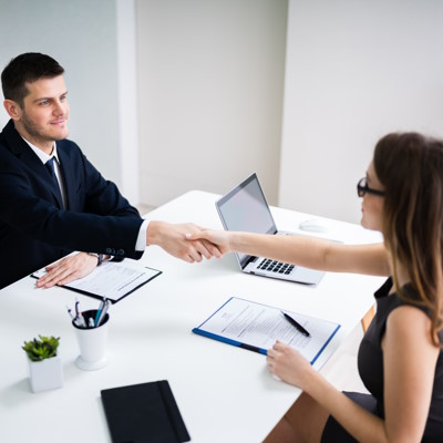 Two successful business people discussing employment