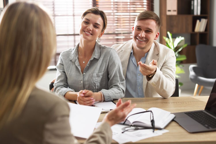 Couple having meeting with attorney Couple having meeting with attorney