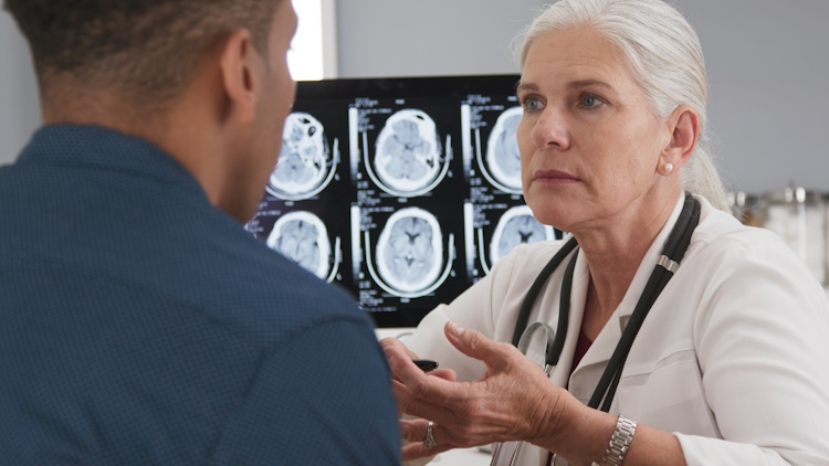 doctor discussing long term effects of injury