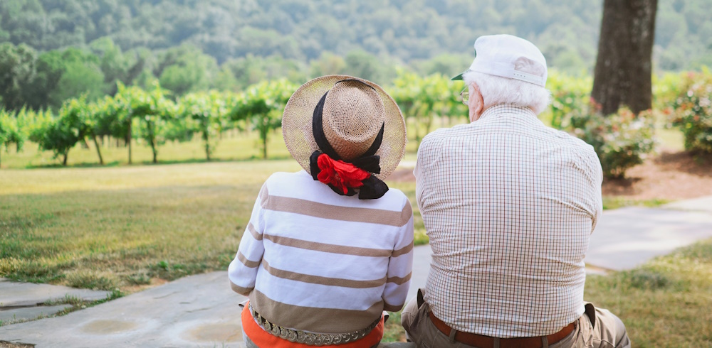 older adults sitting outside