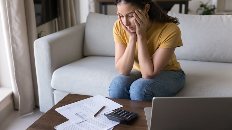 woman is overwhelmed with tax or no tax decision woman is overwhelmed with tax or no tax decision