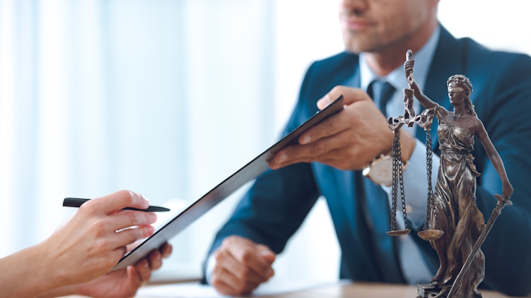 lawyer holding background check results lawyer holding background check results