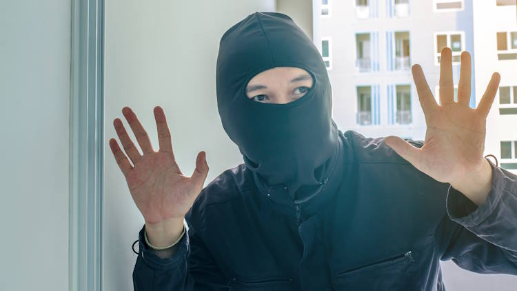 A theft is breaking into a condo