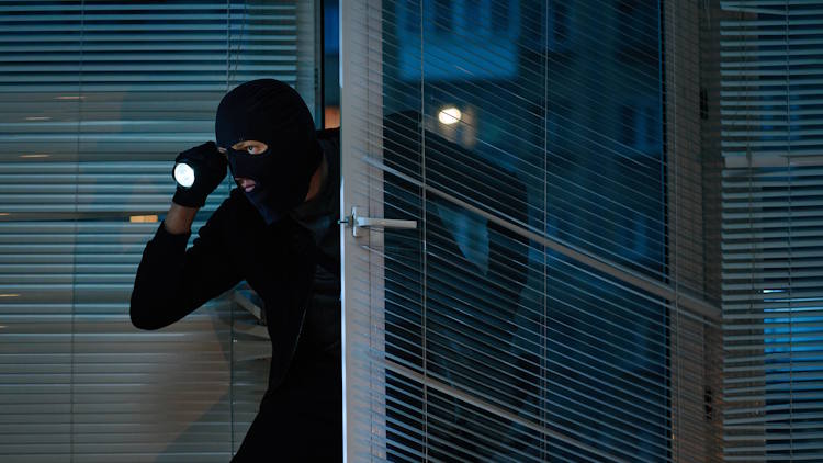 Burglar entering office after hours